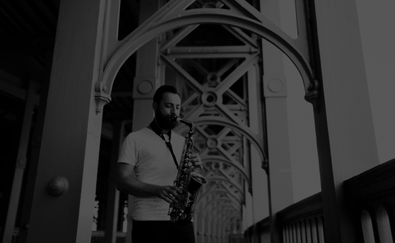 Wayne on Sax, Newcastle upon Tyne, Northumberland. Playing a Selmer series III saxophone on Tyne Bridge.